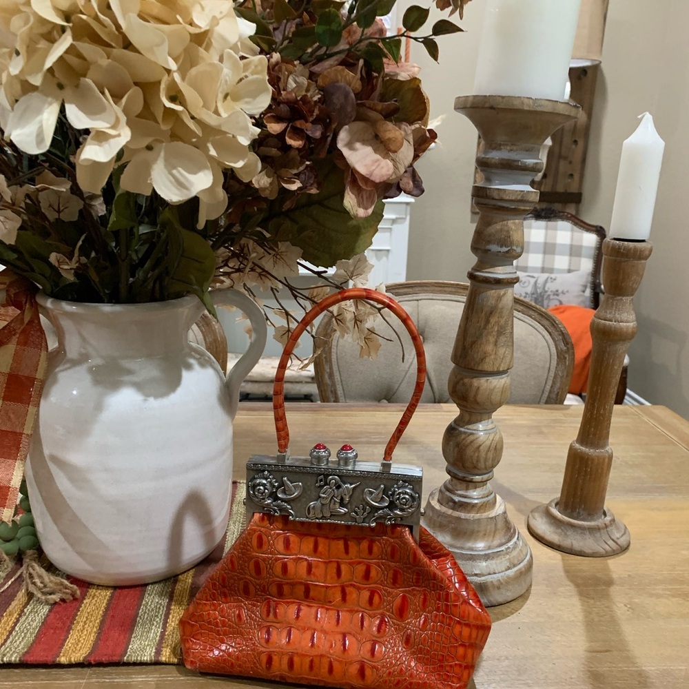 Beautiful crocodile Moulin Rouge handbag in this striking color orange.